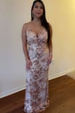 It's a beautiful dress but maybe bc my torso is short or not sure if the dress was defective, the dress design was not fitting on me in S size it was too tight on my ribs. I bought the M size and it was looser on my ribs and I felt more comfortable but it was also loose on my breast area although I don't have a small breast. So I had to tight a lot the dress straps and to used push ups bra to fill the gap - Isabel A.