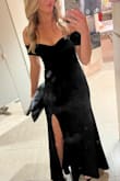 This dress has been to 4 weddings this year, fits like a glove, and makes you feel so elegant. I sized down to XS for the perfect formal fit. - Kristi U.