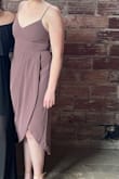 Rib cage is tight but the color is absolutely beautiful!! Perfect for my role in a wedding. - Katie S.