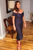 I took a chance purchasing this dress never imagining it would fit so beautifully. It snatched me up in all the right places and the material is wonderful. I highly recommend this dress and will order it in black as soon as it's available. - Anna S.