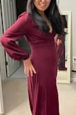 I would say my figure is between "normal" and "pear" shape. I love how free I feel in this dress and don't have to worry about it not flowing over my hip and thighs. If you're petite in the chest and curvier in the bottom, this dress will work for you! I just need to hem about 4 inches myself. I did not know that the back was a deep V, but no complaints here :) I just hope the winter wedding I'd be a part of won't be too cold. - Tiffany L.