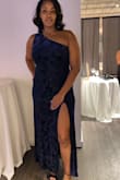 I bought a few options for a formal wedding, and this one won by a mile! The beautiful flower details and textures created with the blend of velvet truly surprised me. I personally sized up to an XL and got the fit I needed, which allowed me to sit or dance all night. The split was enough drama and had heads turning. I felt beautiful! - Angela D.