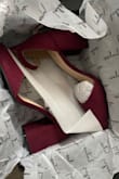 The shoe is too small and heel too high. Please would like to return - Dorith W.