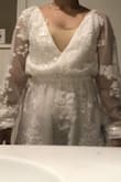 I ordered a XS, but it hangs off of me like a large. Highly disappointed by this romper, and there are no returns so I can't return it - Charlotte S.