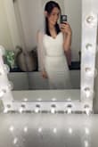 I am still in shock at how beautiful this dress was. It fit perfectly, only thing that I had to adjust was the straps with safety pins. 
The material wasn't see-through, the color was just the right white, and it was fitted and molded my body structure just right. 
My husband and I eloped in Vegas, and it was the perfect dress for it. Every time I show my wedding picture people just compliment how beautiful the dress looked on me. - Diana J.