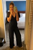 This jumpsuit is incredible, I felt beautiful! I bought a medium even though the website suggested small, and I'm glad I did. My chest size made it a bit difficult to zip up, but it still worked! So I would size up if you have a similar situation. - Danielle P.