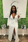 This dress was everything and then some!! I received so many compliments. I could not have asked for a better dress for my small intimate wedding ceremony. - Nikia H.