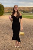 I loved this dress. Wore it to a wedding and felt great in it all night. I have a longer torso, but the curves of the dress still fit mine. Needs to be steamed upon receiving! - Heidi Z.