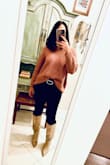 A gift from my husband last Christmas and yes I'm just now writing a review!! Really love this sweater. I got an XS and it is oversized. I'm a petite 5'1. I never wear it hanging down as it looks like it could swallow me but still love how it hangs on my body so I always wear it with the front rolled under and tucked into jeans with a belt, along with my new taupe suede Katari boots, also from Lulus. Really love the feel of this sweater and seems more high-end than the price would lead you to believe!! Would consider other colors if they had my size! - Melissa T.