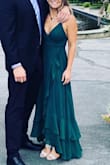 Loved everything about this dress but the quality was disappointing. The spaghettini strap ripped and I was stuck holding my top up all night. - Catie B.