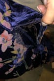 This is a beautiful dress, but the quality is just not there. Thank god it is fully lined with navy fabric. Wore this to a wedding and as I sat down at the ceremony and took off my coat, I noticed the seam at one hip completely shredded where that floral design is, about 4 inches in length. I tried using clear double sided fabric tape to strengthen the material and restitch it but it just continued to shred more and more throughout the night. When I got home, I also noticed the back seam, from the bottom of the zipper to the slit in the bottom completely opened up and shredded as well. Extremely disappointed and expected better. Only wore once, never washed or anything and just completely fell apart. Will likely not be making any purchases from Lulus in the future as it is not worth the risk with such abysmal quality. - Andie M.