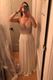 I really like the dress and I am thinking of using it for my wedding reception. I am usually a 4 but the 6 fits almost perfectly, It is just a bit loose on the burst but it is because my burst is almost non existing. The dress is long for me and I will get it shortened. The dress is overall beautiful and unique - Chiara P.