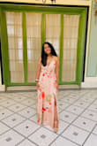 I bought this dress and received a ton of compliments. It is beautiful and well made. The only imperfection I'd note is that it runs a bit long, so you need to hold it at moments while walking or get it altered. I wore pretty tall heels with it and the length was workable without alteration. - Reine R.