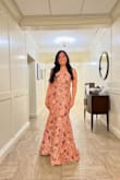 Fits perfectly. I wore 3 inch heels so that the dress would be in a perfect length. - Jeeranan A.