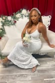 I wore this dress on my wedding day and it was perfect. The fabric was beautiful and emphasized my curves. My husband said I was the most beautiful bride he'd ever seen. - Diamond G.