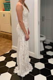 I really love the look of the lace and how fitted it was to give me curve. I almost wore for my wedding but went with another Lulus dress! The dress was a little tight in my upper legs where the seam is, it didn't look right. You can see it on the front facing photo. - Laura W.