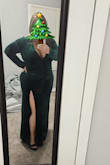 This dress is a stunner. The slit is much higher than expected. (Pictured wearing spanx rolled up on slit side with 4 inch heels) The fabric was great quality and a good weight. There was a decent amount of stretch too making it comfortable while still skimming over the body. I bought this for a NYE wedding, and ultimately ended up returning the dress. 1. It was a bit too revealing to comfortably dance all night without worrying about a wardrobe malfunctuon and 2. It looked to similar to the mother of the bride's dress. I would repurchase if the event was better suited for it. - Alexis R.