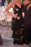 Wore this to a black tie optional wedding and being 5'3 and curvy, it was the only time I haven't had to tailor a dress (medium). I also liked that the straps were adjustable. No stretch though and you can't take long strides, but other than that it's gorgeous, unique, and got compliments. Highly recommend! - Ashleigh K.