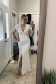 A very pretty dress- it looked great on. I did end up returning as I was not certain I wanted a lace dress. - Cass M.