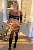 This dress is 100% autumn vibes! I purchased it for my thanksgiving outfit and it was perfect. I paired it with black stockings and knee-high boots. This dress is fitted but comfortable. - Ashleigh W.