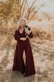 I ordered several dresses for family pics. This one was the winner. I've gained some weight, and not feeling the best. But this dress made me feel beautiful. So flattering. I highly recommend. The plunge V is just enough, although I am not super busty. True to size , did a slight hem wore 2.5 inch bootie. - Melissa W.
