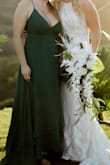 My bestie got married and her bridal party color was emerald green. I ordered a different dress and the color was way off. I ordered this dress on a hope and a prayer that it would be the correct color AND fit. It came in the mail to a friends house. I didn't get to see it until they day before, lots of anxiety over this dress. It was perfect!!! Perfect color, perfect fit, the back lace up detail is so cute. Heads up if you have slightly larger boobs definitely wear boob covers. If you have time it would be worth it to put a few stitches of wear the fabric covering your chest comes together. My right boob wanted to pop out. After 5 hours the straps around my shoulders started to dig into my skin but whatever. - Liz K.