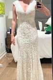 It fit perfectly, absolutely would need no alternations if in heels. I will end up cutting it off to make it short for the summer as I chose a different Lulus dress due to needing long sleeve. I considered sending it back since I chose the other dress but everyone agreed should keep it for next season! - Ashley B.