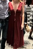 This dress is very cute, very booby! I got a medium but I might get it taken in a little bit because the tie in the back cannot tighten it very much. The tule is not itchy which is always a concern I have with tule, so very happy about that! Definitely wear nipple covers with this dress because a nip slip is possible. - Mary B.