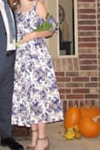 It's so gorgeous fr. It arrived on time and it looks just like the picture. it feels a little bit like a curtain or an old person's couch but if you are into that then this is the dress for you - Emily J.
