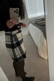 It's super cute but does run big. I bought skirts from Lulus before that were a size S and they fit perfectly but these do run big (see pics). It's too late for me to return as I wore it already but would recommend a size down if you're about my size. - Kat C.