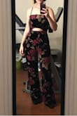 The material is beautiful but the jumpsuit isn't as flattering as I'd hoped. It was also hard to get over the booty as another reviewer mentioned, but not impossible for me. The legs would also definitely need to be hemmed a couple inches. Will probably return just don't love how it looks on me. - Maddie M.