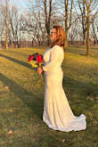 This dress is beautiful!!!! It is heavy and warm. It was perfect for my outdoor November Minnesota wedding. It fits exactly how I thought it would. However, it does show every flaw! So be very cautious of that when thinking of what you wear underneath and of your photos later. And I did not steam it before the ceremony. I didn't have time, so it did show the wrinkles from shipping. It didn't bother me considering the type of very casual ceremony I had. I loved it nonetheless. - Tressa S.