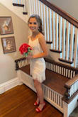 I ordered this dress to be my senior homecoming dress and it is the most inexpensive yet most favorite dress I've ever worn. It has beautiful fringe and sequins which makes it photograph amazingly. I ordered a size up because I was worried about it being too short will tall heels, but it has the perfect length along with adjustable staps which I loved. I sewed padding in but it would be worn just fine with a bra. 12/10 recommend. So beautiful. I also included a photo of me shimmying so you can see it somewhat in motion. - Kiley C.