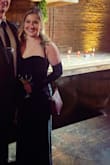 I felt very glam and cool in this dress for a winter black tie wedding in Chicago. Very happy with fit, I did have to get it hemmed  but no big deal. 

However, the gloves completely stained my arms by the end of the night& 
It didn't ruin anything and easily washed off but be weary if the gloves come off in public! - Mackenzie C.