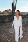 I absolutely loved this dress! If a small would have been available I would have ordered it but I made a medium work. I had to take in the sleeves and I added a small strap across my upper back to keep it from falling down. It turned out beautifully and I truly felt like a bride in it. - Erica S.