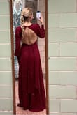 I love this dress! I bout it for my sisters' wedding, where I am the maid of honor. It is classy and timeless, I love the way it flows. And I love that there is no slit! The back is definitely the star of the show. - Clara V.