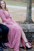 Love this dress. So many compliments. The perfect flowy, wrap dress for formal engagement photos or as a wedding guest dress. You can easily pin the slit to ensure no free shows. - Summer C.