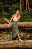 This skirt is one of my favorites.  It's light weight but not see through and lays just right.  You can wear it high waisted for flats or pull it lower for heels. - Julie J.