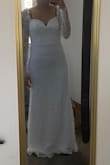I loved the dress, fits perfectly. The fabric is very good quality. The only thing I found in mine was the wire from the bust was sticking out from one side, but besides that It was perfect for me. - Adriana B.
