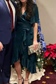 This is a really beautiful dress, very classy in my opinion. I am usually an XS but went with an XXS for this one. The waist was a little snug for me, but overall it fit great and I didn't have any issue at all with the chest gaping as others mentioned. - Meghan L.