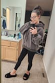They didn't have it in a small, so I ordered an XS reluctantly but I'm so glad I did!!! I love the way it fits, it is def oversized but not too big. I think it is perfect, and a small would have been a bit too big, even at 4 months pregnant. I will be living in it this winter, especially since it has room to accommodate my growing tummy = and it's so warm and cute. No pocket but that's fine by me. I am obsessed!! - Elizabeth D.