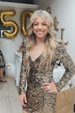 This dress was not only stunning on but fit perfectly. It was comfortable and I got so many complements. Highly recommend this dress! It's beautiful! - Nichole S.
