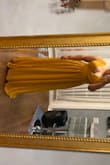 My sister wanted her bridesmaids to match and her matron of honor suggested lulus. She found this dress and the color is perfect and true to picture. We all receive it and it fits perfect on the top and sleeves but shows the girls a bit much for a wedding so we made a few alterations. And we all had the trouble of the lengths as well. Two of us wore 6" heels and I wore 4" to even our heights a bit since I was a bit taller then the other two. So we hemmed up the lengths and it was perfect. Also it's comfortable. So I took a before the alterations ad then after. - Chadinsky R.