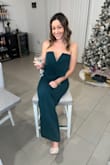 I actually have this jumpsuit in 2 different colors because I love it so much! The length is long and I had to get it altered, but it fits my body so well and stays put up top even though it's strapless. I wore this for my birthday and everyone said how stunning it was! - Abagael J.