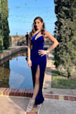 I ordered this dress last minute for my friend's black tie wedding and it fit absolutely perfectly! The material is great and I got so many compliments on how beautiful the color is. Fits true to size and the material steamed very nicely. Definitely recommend this dress. - Sarah B.