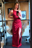 This dress was stunning from the color to the material and the way it flows from hte slit when you walk, without fear of it showing too much. I wore it to a work event and foolishly did not take any pics of me all dolled up in it but it looked and felt great. I wore a strapless bra and had no issues with it slipping. The length is great for those of us with long legs, maybe too long but with heels it fell perfectly. Be careful with your jewelry though as my necklace snagged it at the top and I can't fix it now :(  It fit a little loose at the waist but that made sitting more comfortable than if I got the XS, which probably would've felt too stiff. Overall very happy with my purchase and received many compliments throughout the night. - Allison D.
