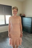 This dress is very small and looks like old-days curtain. - Janis H.