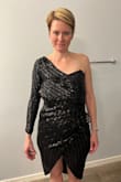 I was so excited for this dress to come. Based on other people reviews I bought one size smaller. It is VERY small and super uncomfortable. The sleeve is very tight and trying to take the dress off I scratched my back. - Janis H.