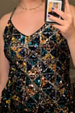 I was nervous to get this dress at first bc it had no reviews but IM SO GLAD I GOT IT!! I wore it to hoco and got a ton of compliments. My only complaint is that the straps arent adjustable but i did my own little adjustment for them to make them more haltered. and it's a pretty short dress but i wore spandex and it was fine. 
such a gorgeous dress. Need to find a different occasion to wear it to. - Ruby A.