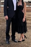 I wore this to a wedding and got so many compliments. The cut is perfect if you tall-ish, it might hit your leg a little weird if you're shorter. The straps are terrible and uncomfortable - my husband had to keep tightening them, but since the bust fit perfectly, they were basically there for decoration anyway. - Caitlyn N.